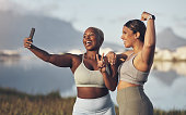 istock Shot of two women taking a selfie while out for a run
together 1313649143