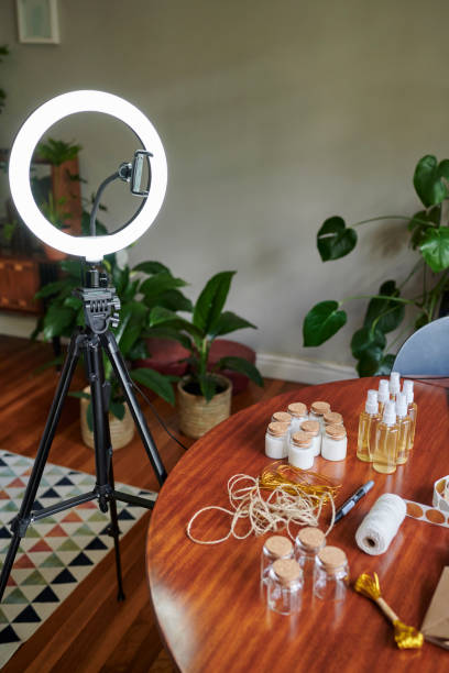 istock Ring light and items on a table in preparation for a vlog post 1313649195