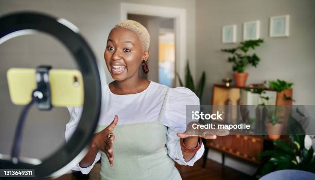 Smiling Young African Female Influencer Doing A Vlog Post At Home Stock Photo - Download Image Now