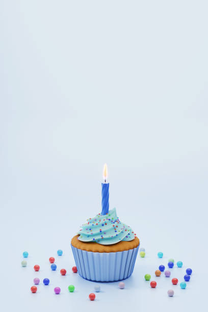 istock Festive cupcake with candle on blue background, 3d rendering. 1313649402