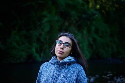Portrait of a woman in the nature, at the Coihuin river