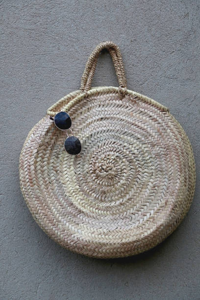 istock Straw Bag and Sunglasses 1313653703