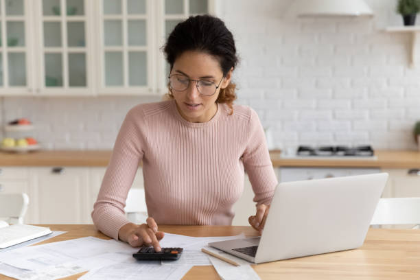 istock Young female student check tuition fee sum before pay online 1313653801