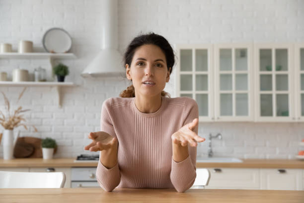 istock Young lady vlogger look at camera speak give expert review 1313654587