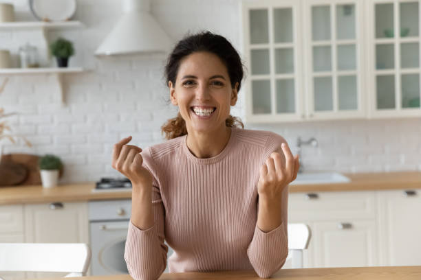 istock Friendly millennial lady coach look at camera shoot motivational training 1313654588