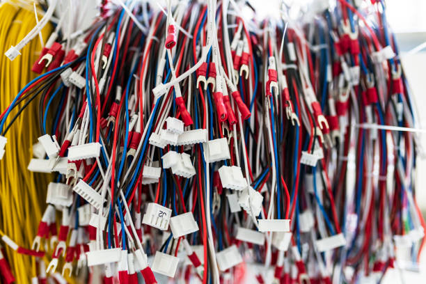 istock Wiring harnesses, production. Industrial background with copy space. 1313655382