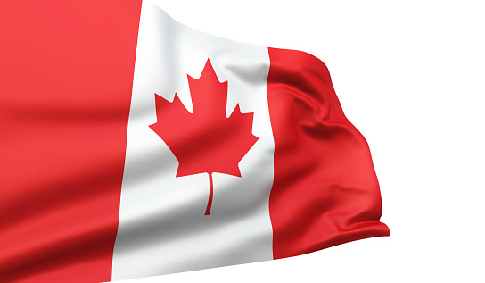 close up waving flag of Canada. flag symbols of Canada. Canada national flag waving in beautiful sky.