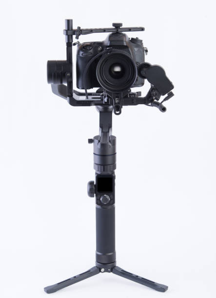 istock DSLR gimbal, professional camera stabilizer, white background, photographed in studio. 1313664529