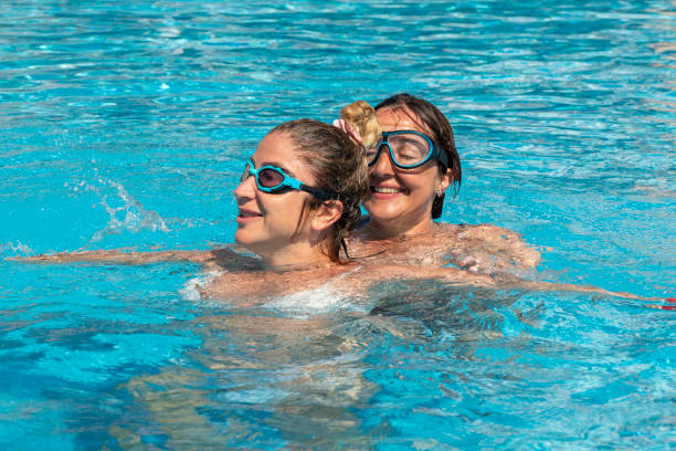 istock Pool friends in a sunny day. 1313671972