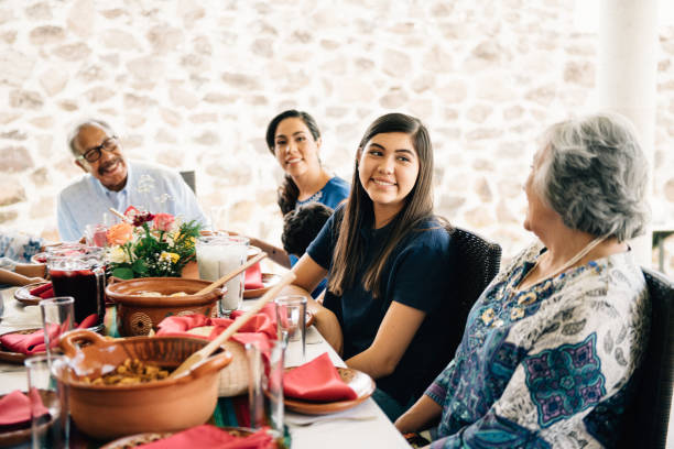 istock Multi-generation family eating together outdoors 1313674594