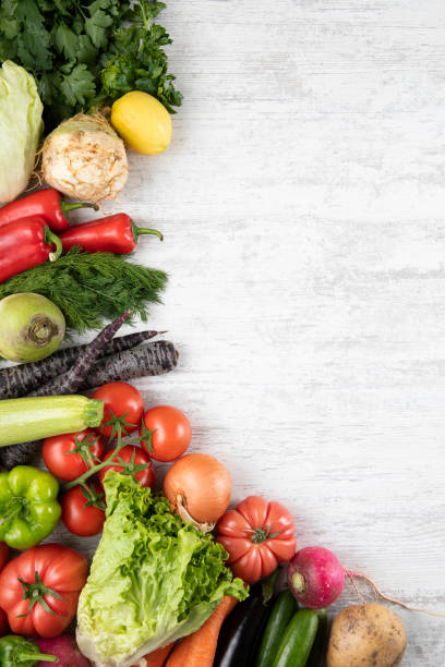 istock Fresh and Raw Vegetables on Wooden Background 1313675557