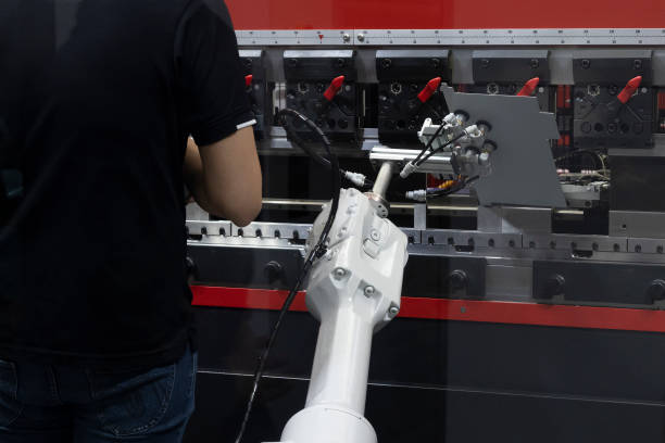 istock The technician operator repair the robotic system with hydraulic press brake bending machine. 1313677225