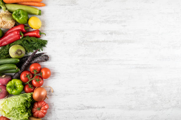 Vegetables in basket on white background