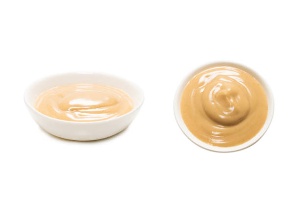 istock Mushroom sauce in a bowl isolated on white background. 1313677772