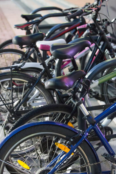 istock Bicycles in a parking lot at night 1313681332