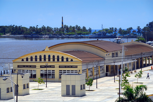 Santo Domingo, Dominican Republic: Muelle de Santo Domingo, the cruise terminal located on the right bank of the Ozama River estuary on the Caribbean Sea, in the background warships moored in the Dominican Navy dock.
