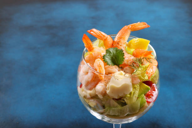 Prawn Cocktail Prawn or Shrimp Cocktail with avocado lettuce and mayonnaise prawn seafood stock pictures, royalty-free photos & images