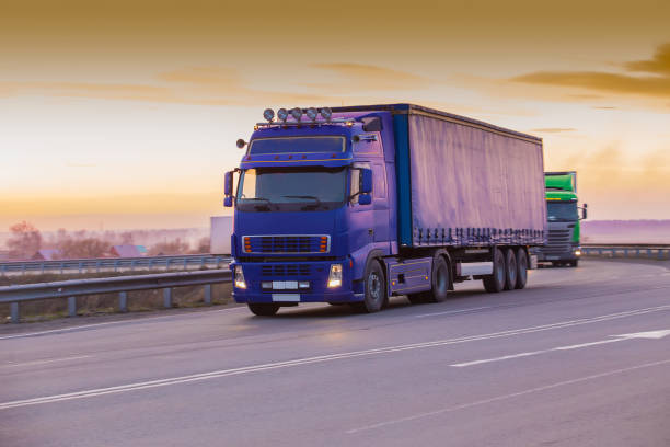 istock trucks goes on the highway 1313682242