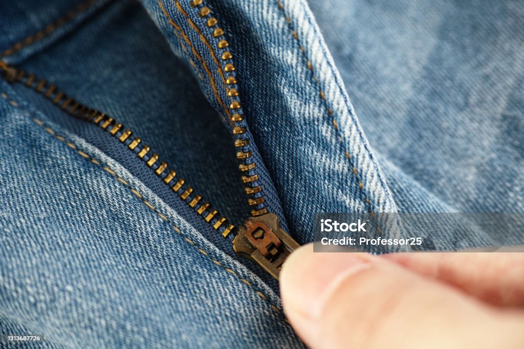 A Man Unzipping Jeans Stock Photo - Download Image Now - Adult, Adults ...