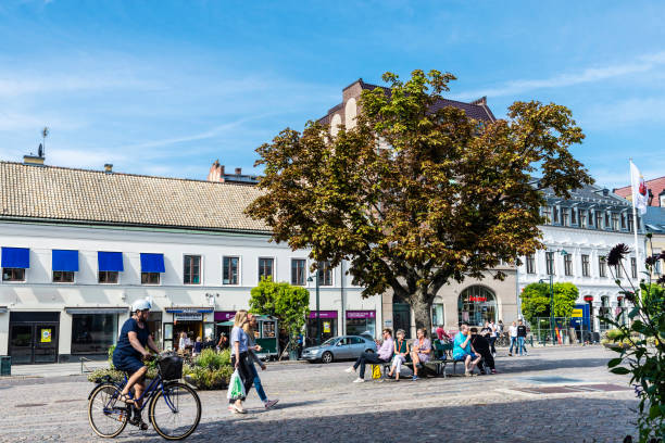 Stortorget square in Lund, Scania, Sweden Lund, Sweden - August 30, 2019: Stortorget square with shops and people around in Lund, Scania, Sweden stortorget photos stock pictures, royalty-free photos & images