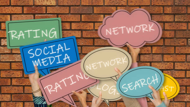 istock Social Media emotion Icons with hands on brick wall 1313698763