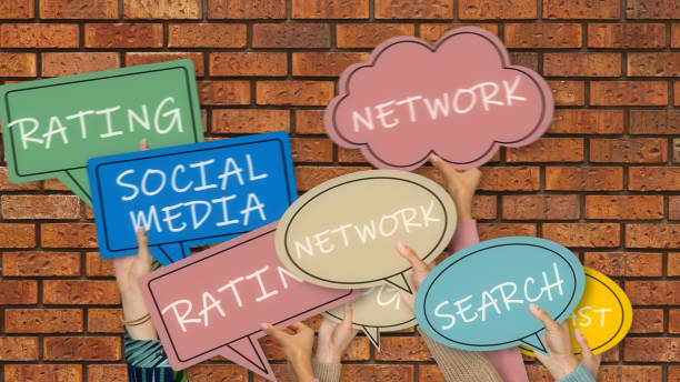 istock Social Media emotion Icons with hands on brick wall 1313698767