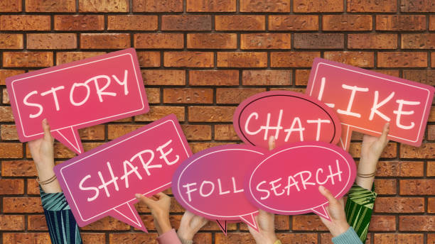 istock Social Media emotion Icons with hands on brick wall 1313698794