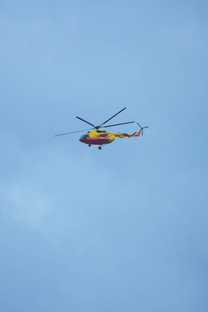 istock Helicopter Flight yellow windship in the blue sky 1313699162