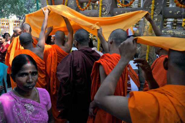 07th november 2011 bodh gaya bihar india :Bodh monks are circumambulating the Mahabodhi Temple during the Buddhist Festival Munlam in Bodh Gaya.