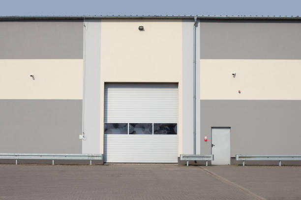 istock Rolling gate or roller shutter used for factory, warehouse or hangar. 1313705653