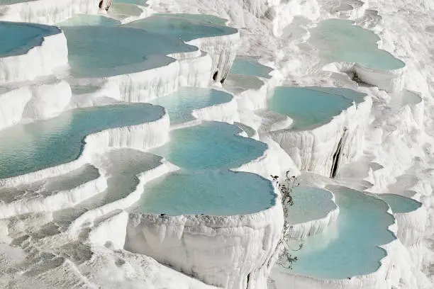 Natural travertine pools and terraces in Pamukkale, Turkey.