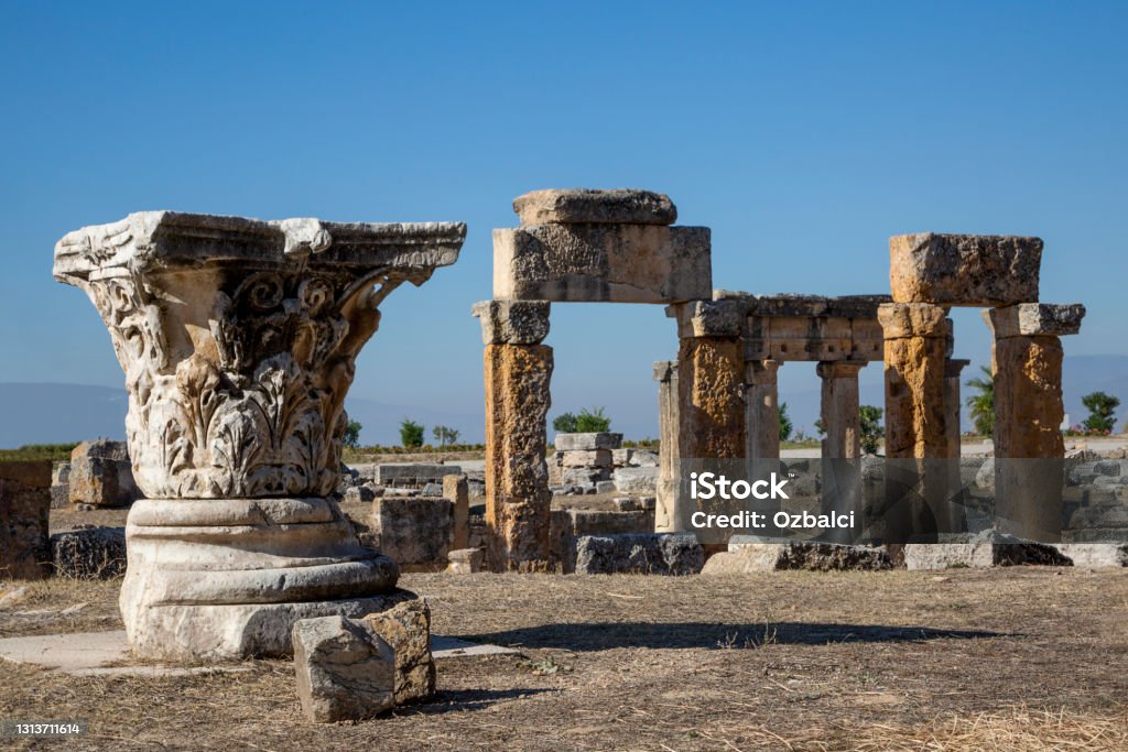 Remains of the ancient site of Hierapolis in Pamukkale, Turkey Ruins of Roman city of Hierapolis, Pamukkale, Turkey. Hierapolis Stock Photo