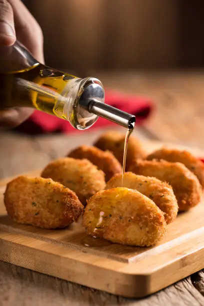 Cod dumpling. Traditional brasilian snack. Bacalão Bunuelos.