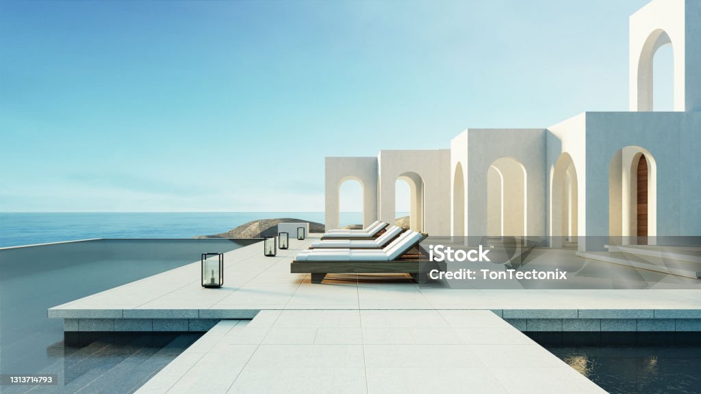 Luxury beach and Pool villa Santorini style - 3d rendering Chaise Longue Stock Photo