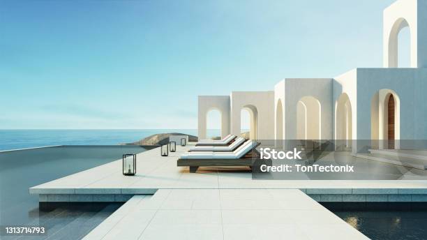 Luxury Beach And Pool Villa Santorini Style 3d Rendering Stock Photo - Download Image Now