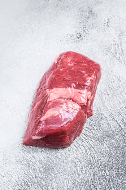 istock Raw veal meat steak fillet. White background. Top view. Copy space 1313726980