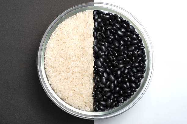 Rice and black beans Rice and black beans in a bowl beans and rice stock pictures, royalty-free photos & images