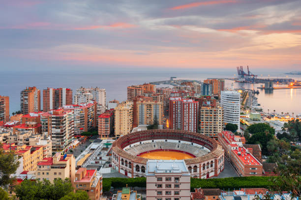 istock Malaga, Spain dawn skyline towards the Mediterranean Sea 1313728084