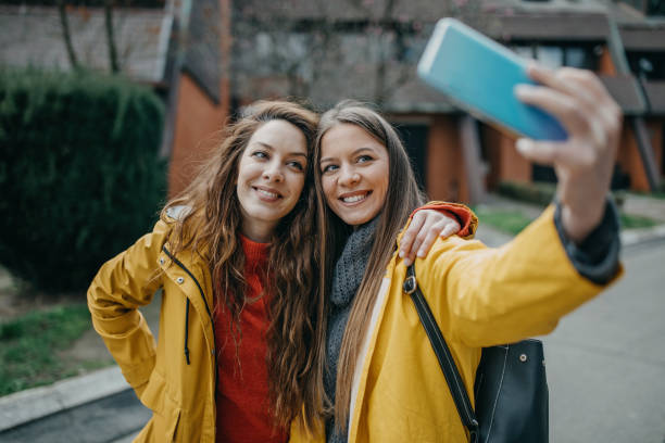 istock Attractive young woman using phone 1313730980