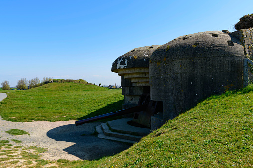 Part of the remains of Mulberry harbour on public display above Gold Beach, site of the World War Two landings at Arromanches les Bains on the Normandy coast of France.
