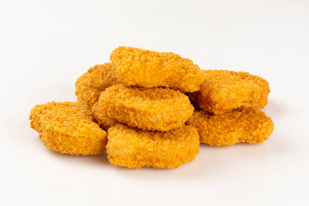 istock Fried chicken nuggets isolated on the white background. 1313732569