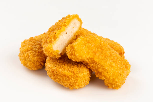 istock Fried chicken nuggets isolated on the white background. 1313732586