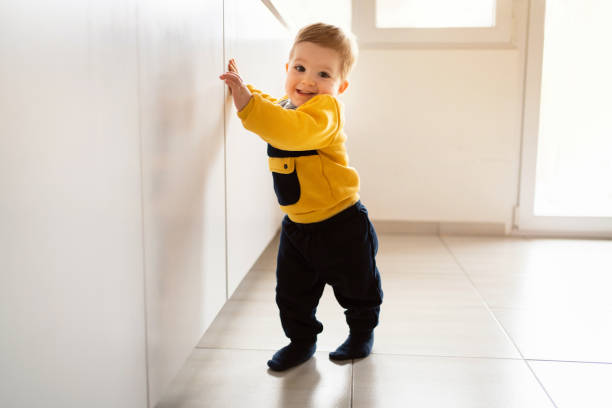 istock Cute baby boy making his independent steps at home 1313733565