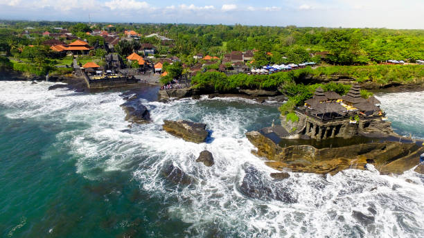 istock Tanah Lot Temple with big ocean waves crash 1313736302
