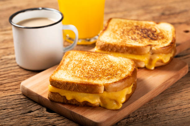 istock Grilled ham and cheese. Sandwich with cheese and ham on grill. 1313739980