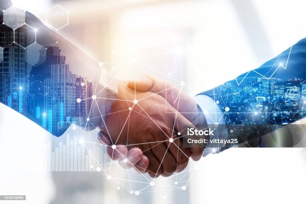 Business Partnership. business man investor handshake with effect global network link connection and graph chart of stock market graphic diagram, digital technology, internet and partnership concept Partnership - Teamwork Stock Photo