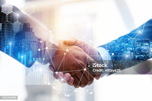 Business Partnership Business Man Investor Handshake With Effect Global Network Link Connection And Graph Chart Of Stock Market Graphic Diagram Digital Technology Internet And Partnership Concept Stock Photo - Download Image Now