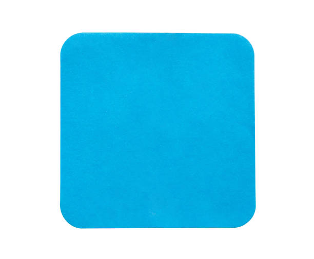 istock Blank blue square adhesive paper sticker label isolated on white background 1313744273