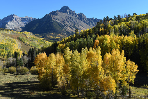 Mt Sneffels (14,158-foot/4315.4 m) dominating the autumn scenery of the Mount Sneffels Wilderness, Uncompahgre National Forest, Rocky Mountains, Colorado.