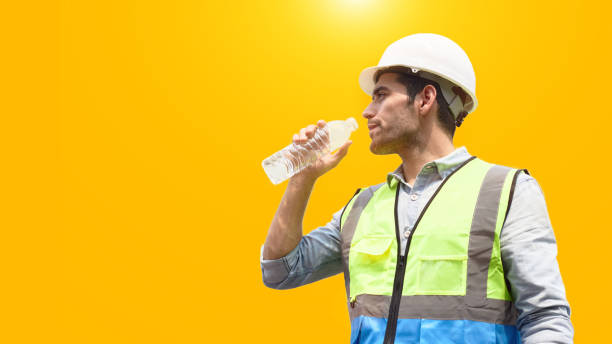 istock The construction worker drinks water to quench his thirst. 1313750237
